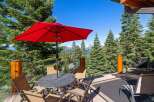 Enjoy breathtaking lake and mountain views from this stunning deck, perfect for outdoor entertaining.