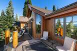 Enjoy breathtaking mountain and lake views from this stunning wooden deck, perfect for outdoor entertaining or quiet relaxation.