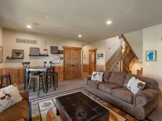 Step into this inviting game room, perfect for family fun and relaxation.