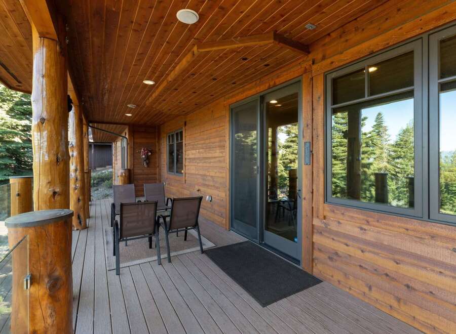 Enjoy the stunning mountain views from this expansive covered deck, perfect for outdoor dining and relaxation.