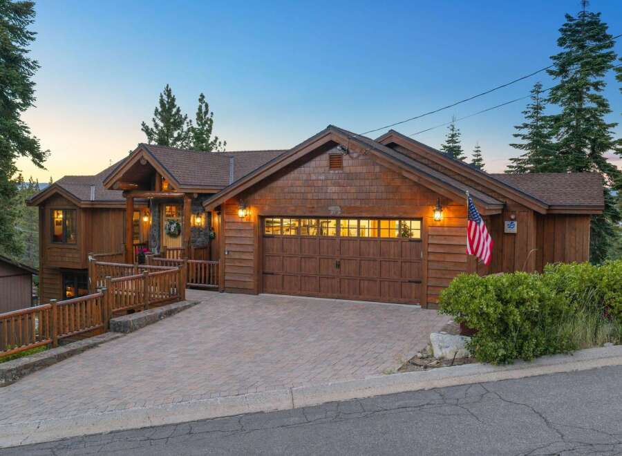 Experience rustic charm and modern comfort in this stunning wooden mountain home.