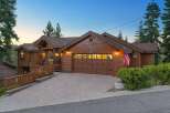 Experience rustic charm and modern comfort in this stunning wooden mountain home.