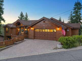 Experience rustic charm and modern comfort in this stunning wooden mountain home.