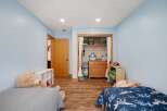 This charming bedroom features two cozy beds, perfect for siblings or sleepovers.