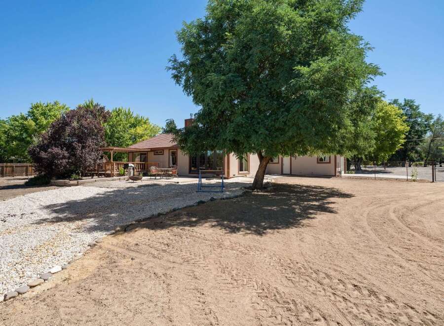 Discover this charming home with a spacious backyard, perfect for outdoor entertaining.