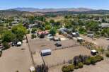 Discover this expansive property featuring a large riding arena perfect for equestrian activities.