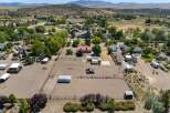 Discover this expansive property featuring a large riding arena, perfect for equestrian enthusiasts.