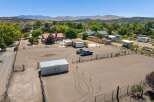 Discover this expansive property featuring a large, fenced arena perfect for equestrian activities.