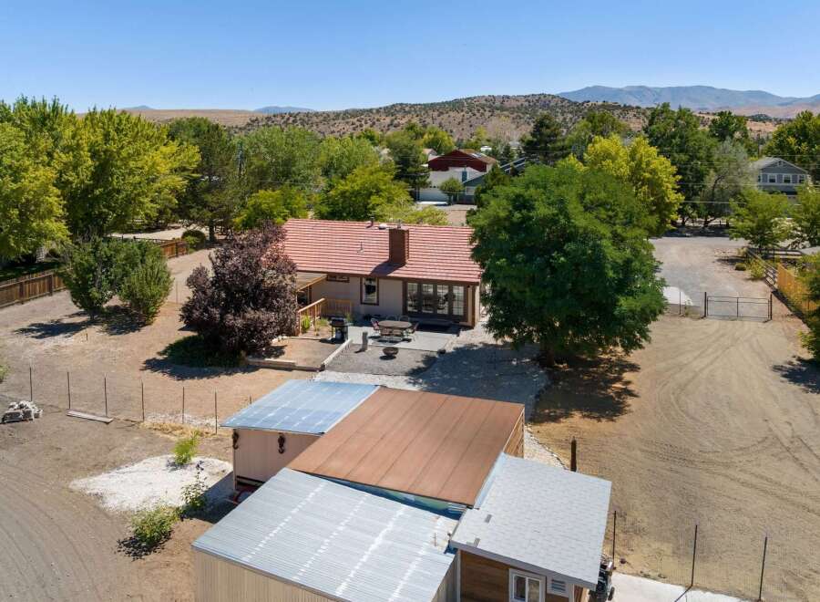 Discover this charming home featuring a spacious backyard with a patio, perfect for outdoor entertaining.