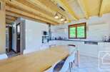 Discover this charming kitchen and dining area, perfect for family gatherings.