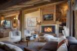 Experience the epitome of rustic luxury in this stunning mountain lodge living room.