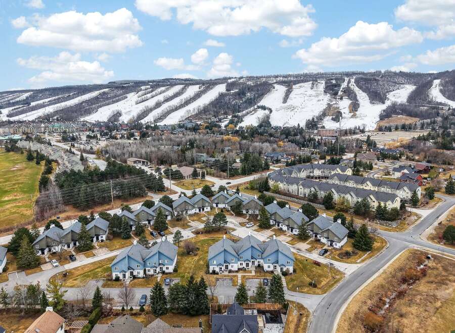 Discover this charming residential community nestled at the base of a ski resort, offering a perfect blend of mountain living and suburban comfort.
