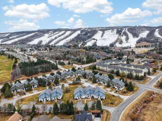 Discover this charming residential community nestled at the base of a ski resort, offering a perfect blend of mountain living and suburban comfort.