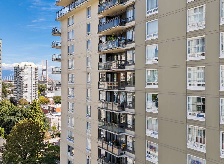 Experience urban living in this high-rise apartment building, featuring spacious balconies with stunning city and water views.