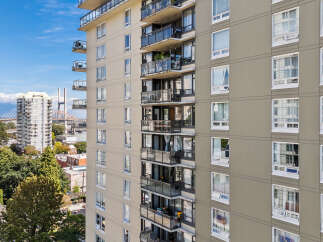 Experience urban living in this high-rise apartment building, featuring spacious balconies with stunning city and water views.