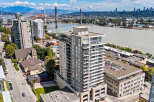 Experience modern urban living in this stunning high-rise apartment with breathtaking city and water views.