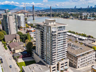 Experience modern urban living in this stunning high-rise apartment with breathtaking city and water views.