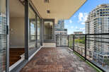 Enjoy breathtaking city views from this spacious balcony, perfect for entertaining or relaxing.