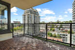 Enjoy breathtaking city views from this spacious balcony, perfect for relaxing or entertaining.