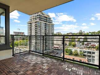 Enjoy breathtaking city views from this spacious balcony, perfect for relaxing or entertaining.