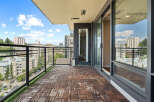 Enjoy breathtaking city views from this spacious balcony, perfect for outdoor living and entertaining.