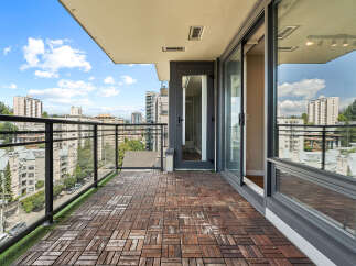 Enjoy breathtaking city views from this spacious balcony, perfect for outdoor living and entertaining.