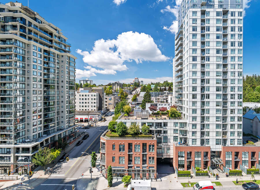 Experience modern urban living in this stunning apartment complex featuring sleek architecture and expansive balconies.