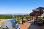 Enjoy breathtaking panoramic views from this stunning deck, perfect for entertaining or relaxing.