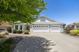 Discover this charming single-story home featuring a spacious three-car garage and a beautifully landscaped front yard.