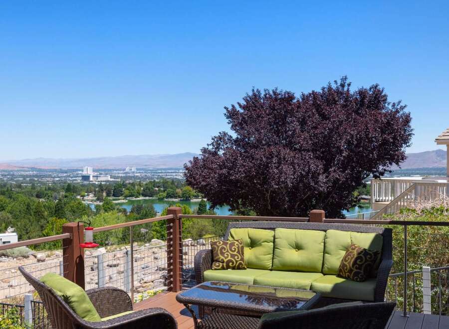 Enjoy breathtaking panoramic views from this stunning deck, perfect for entertaining or relaxing.
