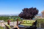 Enjoy breathtaking panoramic views from this stunning deck, perfect for entertaining or relaxing.
