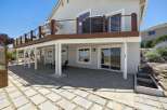 Enjoy outdoor living with this spacious patio, perfect for entertaining or relaxing.
