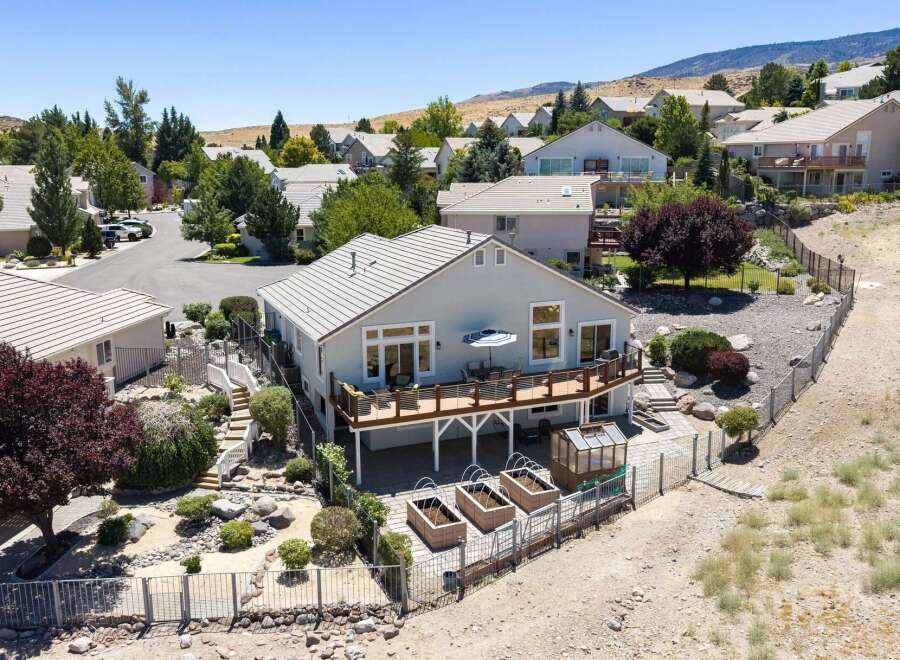 Discover this stunning home with a spacious deck perfect for entertaining and enjoying the scenic views.
