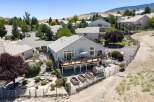 Discover this stunning home with a spacious deck perfect for entertaining and enjoying the scenic views.