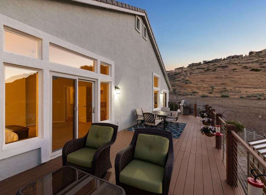 Enjoy breathtaking sunset views from this stunning deck, perfect for outdoor entertaining.