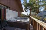 Experience ultimate relaxation with this inviting hot tub, perfectly situated on a private deck with stunning mountain views.