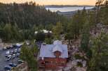 Nestled amidst a dense pine forest with a stunning lake view, this property offers a unique mountain retreat.
