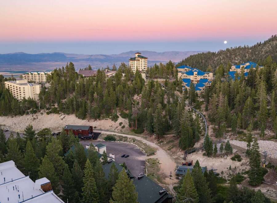 Discover this stunning mountain resort offering breathtaking panoramic views and luxurious accommodations.