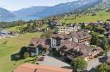 Nestled in a picturesque Swiss alpine village, this property offers breathtaking mountain and lake views.