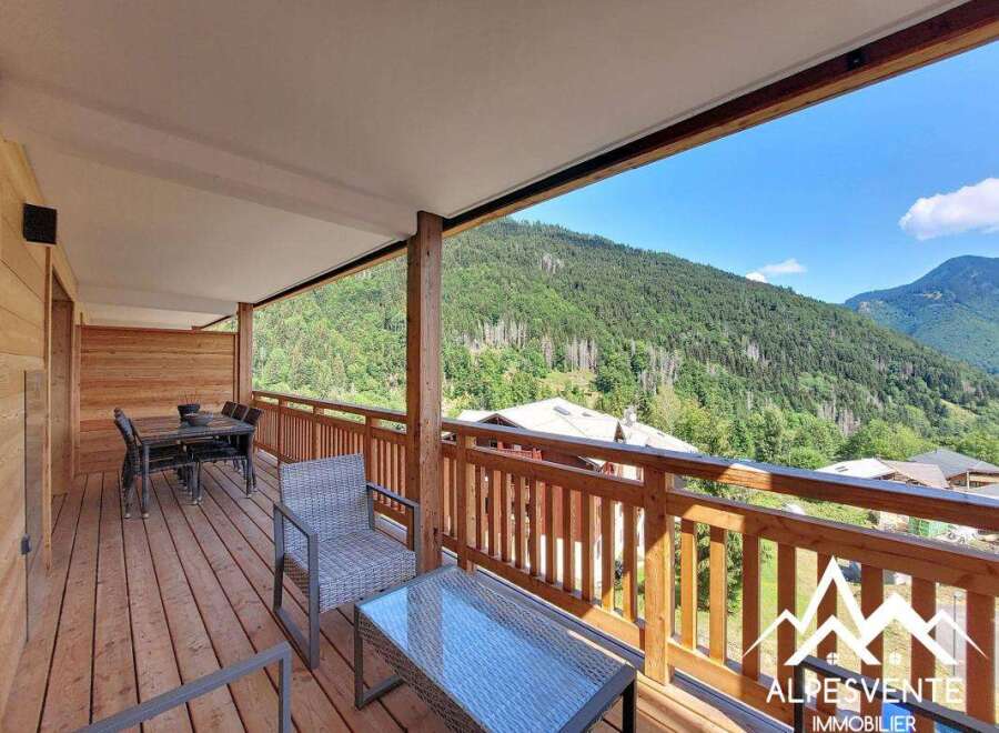 Enjoy breathtaking mountain views from this spacious balcony, perfect for al fresco dining or relaxing with a morning coffee.