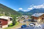 Discover this charming property nestled in a picturesque mountain village, offering breathtaking views of the surrounding Alps.