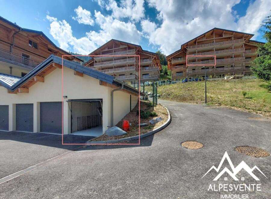 Discover this charming property featuring a spacious garage with multiple bays, perfect for vehicle storage or a workshop.
