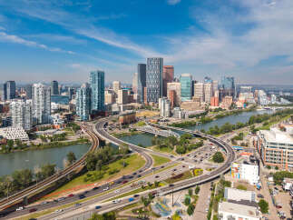 Experience urban living at its finest with this stunning aerial view of a vibrant city skyline.
