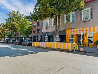 Discover vibrant urban living with this charming commercial space, perfect for a bistro or retail venture.