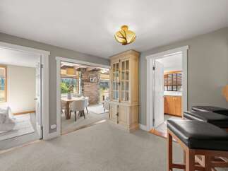 Discover a charming home with versatile living spaces, perfect for entertaining and relaxation.