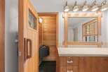 Experience ultimate relaxation in this home featuring a private sauna, perfect for unwinding after a long day.