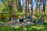 Enjoy the outdoors in this charming backyard oasis, perfect for relaxation and entertaining.
