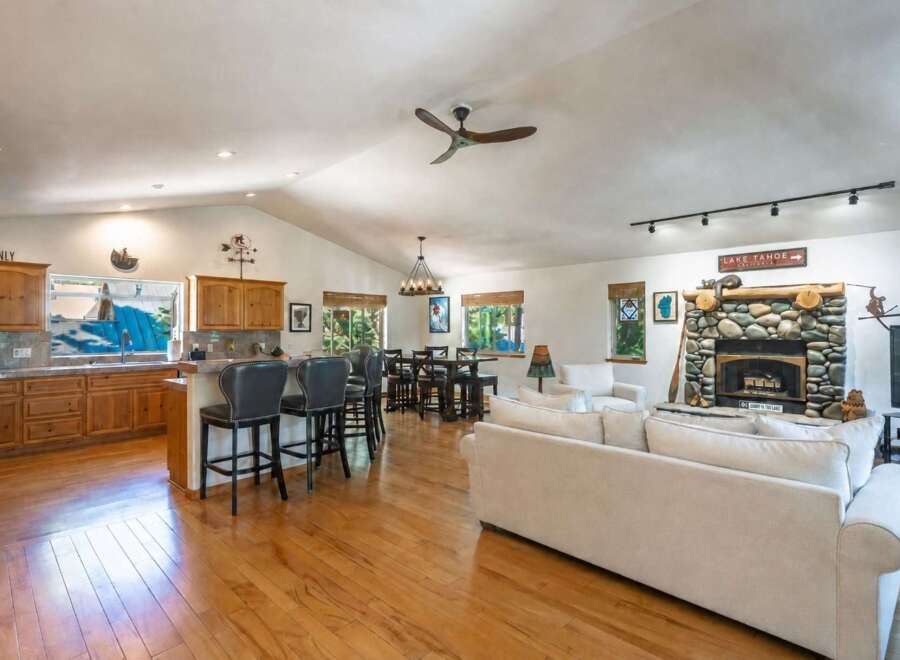 Experience the ultimate lake house living in this stunning open-concept home, perfect for entertaining.