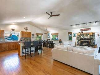Experience the ultimate lake house living in this stunning open-concept home, perfect for entertaining.