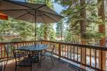 Enjoy the serene mountain views from this charming balcony, perfect for outdoor dining or morning coffee.